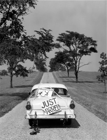 route - 1950s BACK OF WHITE FORD SEDAN DRIVING OFF WITH JUST MARRIED SIGN ON TRUNK Stock Photo - Rights-Managed, Code: 846-02795536