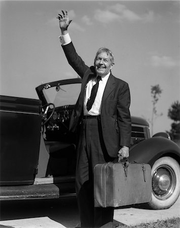 person waving retro vintage image - 1930s RETRO MAN SUITCASE LUGGAGE WAVE HAND SUIT CAR GREETING Stock Photo - Rights-Managed, Code: 846-02795552