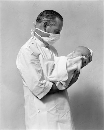 photos of people working in the 1940s - 1940s DOCTOR BABY NEWBORN INFANT DELIVERY MASK Stock Photo - Rights-Managed, Code: 846-02795578
