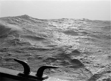 OCEAN WAVES REFLECTING SUN SEEN OFF OF SIDE OF BOAT Stock Photo - Rights-Managed, Code: 846-02795584