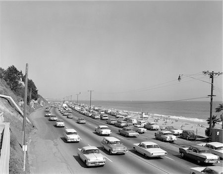 1950s 1960s HIGHWAY TRAFFIC CARS ALONG MALIBU BEACH SANTA MONICA CALIFORNIA USA TRANSPORTATION Foto de stock - Con derechos protegidos, Código: 846-02795606