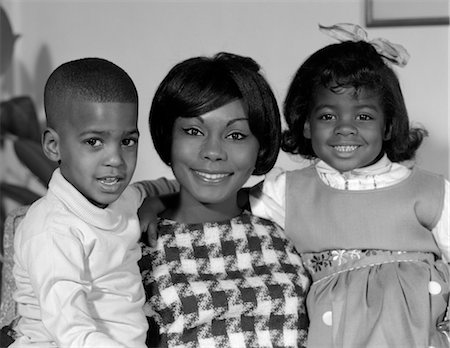 simsearch:846-02796911,k - 1960s PORTRAIT OF AFRO-AMERICAN MOTHER WITH ARMS AROUND SON & DAUGHTER Stock Photo - Rights-Managed, Code: 846-02795699