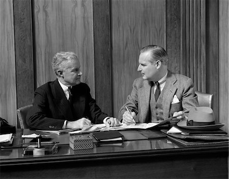 1940s MEN DESK PAPERWORK MEETING SUIT HAT BUSINESS Stock Photo - Rights-Managed, Code: 846-02795763