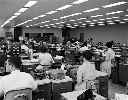 retro scene - 1960s BACK VIEW OF MEN AND WOMEN AT TYPEWRITERS Stock Photo - Rights-Managed, Code: 846-02795801