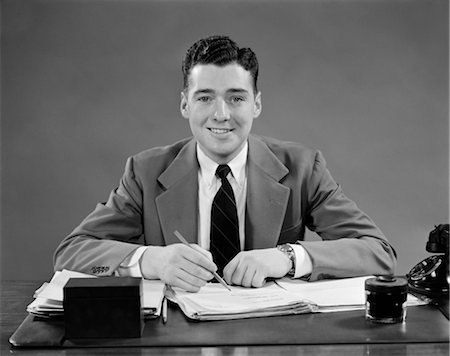 simsearch:846-02795827,k - 1940s MAN SITTING AT DESK IN OFFICE Stock Photo - Rights-Managed, Code: 846-02795828