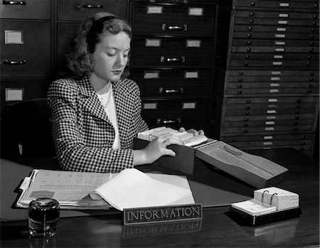 simsearch:846-02795848,k - 1940s WOMAN INFORMATION SECRETARY RECEPTIONIST FILE Stock Photo - Rights-Managed, Code: 846-02795848