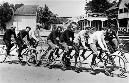 1890s 1900s TURN OF THE CENTURY LARGE GROUP OF MEN ON TANDEM & QUADRICYCLE BICYCLES Foto de stock - Con derechos protegidos, Código: 846-02795881