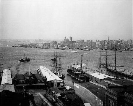 panoramic photos new york - 1890s 1900S PANORAMA OF NEW YORK HARBOR SHIPS IN FOREGROUND CITY IN BACKGROUND Stock Photo - Rights-Managed, Code: 846-02796006