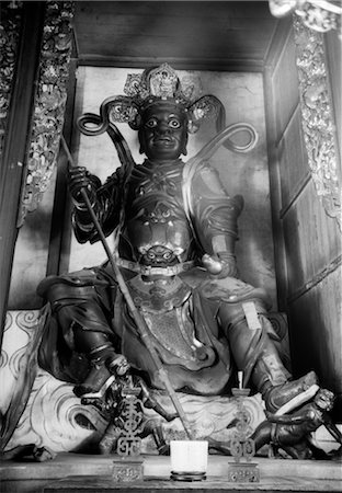 1920s 1930s STATUE CHINESE TEMPLE GUARDIAN AT ENTRANCE TO TEMPLE SINGAPORE Stock Photo - Rights-Managed, Code: 846-02796268