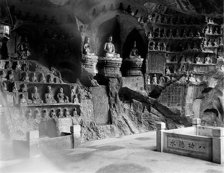 1920s 1930s INTERIOR SCENE IN THE CAVE OF THE THOUSAND 1000 BUDDHAS HANGCHOW CHINA BUDDHIST RELIGION Stock Photo - Rights-Managed, Code: 846-02796301