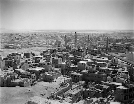 egypt in black and white - 1920s 1930s ELEVATED OVERVIEW OF CAIRO EGYPT FROM THE CITADEL SKYLINE DOTTED WITH MINARETS CITYSCAPE Stock Photo - Rights-Managed, Code: 846-02796314