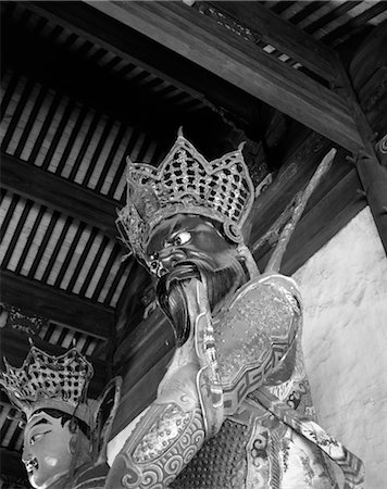simsearch:846-02796293,k - 1920s 1930s MEAN LOOKING STATUE OF LUNGWA GOD OF WAR IN SHANGHAI CHINA Stock Photo - Rights-Managed, Code: 846-02796398
