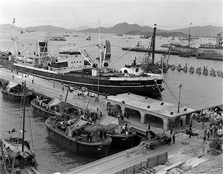 schwarzweiß - ZWANZIGER JAHRE DREIßIGER JAHRE BESCHÄFTIGT DOCK KOWLOON HARBOR HONG KONG SCHIFF SCHIFFFAHRT Stockbilder - Lizenzpflichtiges, Bildnummer: 846-02796403