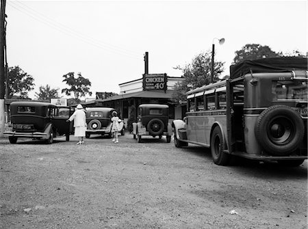 diner - 1930s ROADSIDE DINER RESTAURANT BUS STOP WOMAN GIRL IN PARKING LOT CARS CHICKEN 40 CENTS CROTON NEW YORK JULY 5 1937 Stock Photo - Rights-Managed, Code: 846-02796486