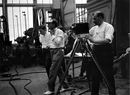 studio film - 1910s SUMMER 1916 TRAVERS VALE DIRECTING RUSSIAN SILENT MOTION PICTURE AT BRADY STUDIO CONVERTED GREENHOUSE ROOF FORT LEE NJ Stock Photo - Rights-Managed, Code: 846-02796490