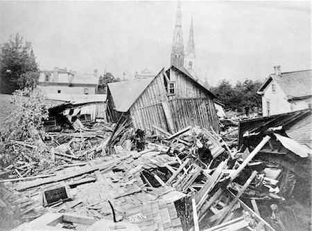 MAY 31 1889 PHOTO RUINS WOODED BUILDINGS HOUSES DEBRIS FROM JOHNSTOWN FLOOD PENNSYLVANIA FLOODS DISASTER TRAGEDY DEVASTATION Stock Photo - Rights-Managed, Code: 846-02796509