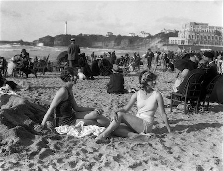 1920s TWO WOMEN SITTING ON BEACH BIARRITZ FRANCE BAY BISCAY BATHING SUIT Stock Photo - Rights-Managed, Code: 846-02796656