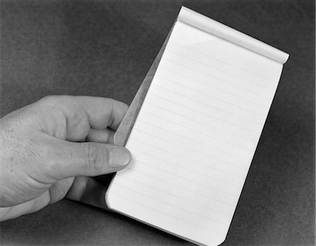 picture male back black and white - MAN'S HAND HOLDING SMALL NOTE PAD TABLET LINED RULED PAPER COVER FLIPPED BACK SHOWING A BLANK PAGE EMPTY NOTHING Stock Photo - Rights-Managed, Code: 846-02796787