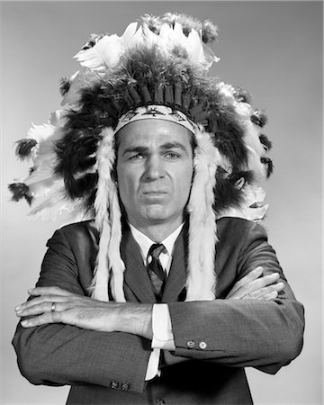 1960s PORTRAIT MAN WEARING INDIAN CHIEF FEATHERED HEADDRESS Stock Photo - Rights-Managed, Code: 846-02796956