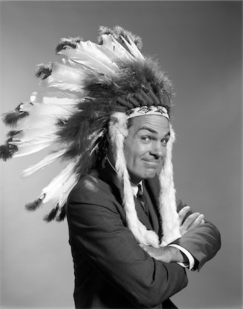 1960s PORTRAIT MAN WEARING INDIAN CHIEF FEATHERED HEADDRESS Stock Photo - Rights-Managed, Code: 846-02796957