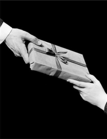 retro man woman gift - 1930s MAN AND WOMAN HANDS EXCHANGING GIFT Stock Photo - Rights-Managed, Code: 846-02796972