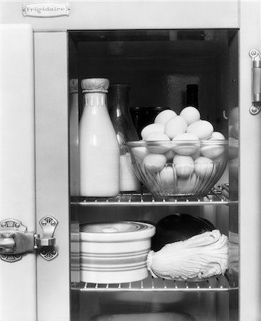 refrigerator door - 1940s REFRIGERATOR WITH MILK EGGS LETTUCE Stock Photo - Rights-Managed, Code: 846-02797037