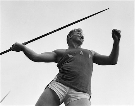 1960s TRACK AND FIELD ATHLETE READY TO THROW JAVELIN Stock Photo - Rights-Managed, Code: 846-02797144