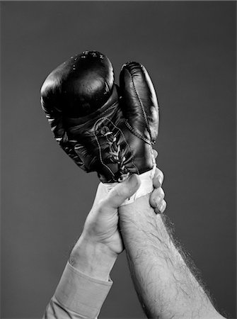 referee - 1950s GLOVED HAND OF WINNER OF BOXING MATCH BEING HELD UP BY REFEREE Stock Photo - Rights-Managed, Code: 846-02797380