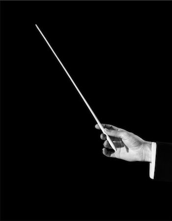 1930s MALE ORCHESTRA CONDUCTOR'S HAND HOLDING BATON Stock Photo - Rights-Managed, Code: 846-02797481