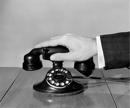 1930s 1940s MAN'S HAND ON TELEPHONE Stock Photo - Rights-Managed, Code: 846-02797520