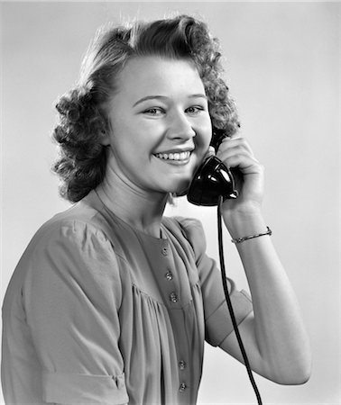 1940s YOUNG GIRL TALKING ON PHONE Stock Photo - Rights-Managed, Code: 846-02797570