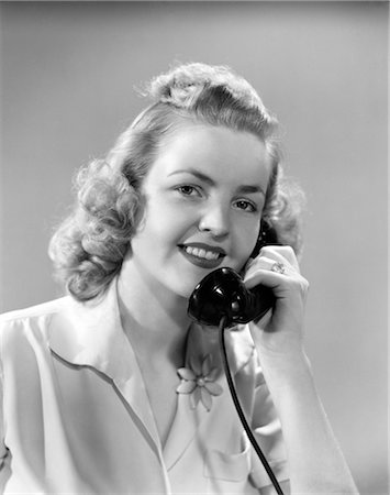 1930s 1940s YOUNG WOMAN TALKING ON TELEPHONE Stock Photo - Rights-Managed, Code: 846-02797586