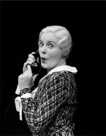 shocked faces in black and white - 1930s WOMAN TALKING ON TELEPHONE SURPRISED EXPRESSION ON FACE Stock Photo - Rights-Managed, Code: 846-02797661