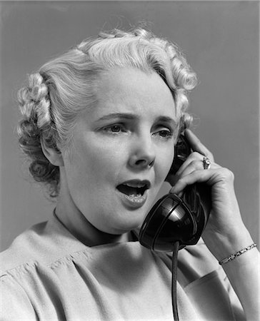 1930s WOMAN TALKING ON TELEPHONE Stock Photo - Rights-Managed, Code: 846-02797692