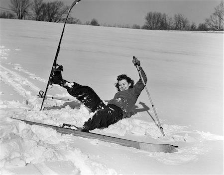 simsearch:846-02797758,k - 1930s WOMAN FALLING IN SNOW ON SKIS LAUGHING Stock Photo - Rights-Managed, Code: 846-02797755