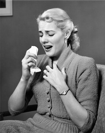 simsearch:846-05645866,k - 1950s BLOND WOMAN SNEEZING HOLDING HANDKERCHIEF Stock Photo - Rights-Managed, Code: 846-02791683