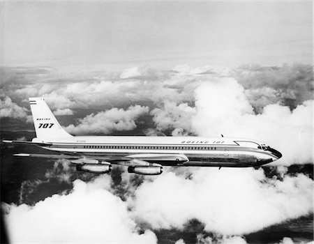 passenger airplane - 1950s BOEING 707 PASSENGER JET FLYING THROUGH CLOUDS Stock Photo - Rights-Managed, Code: 846-02791801