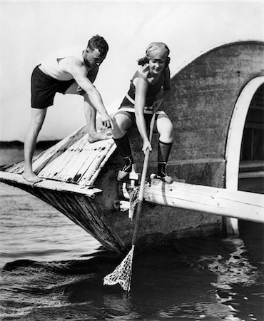 retro fishing - 1940s MAN WOMAN FISHING NET OCEAN Foto de stock - Con derechos protegidos, Código: 846-02792257
