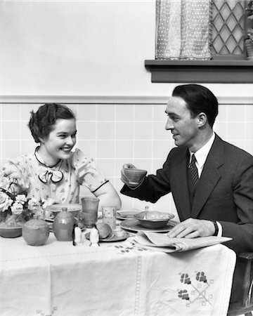 retro drink - 1930s COUPLE EATING BREAKFAST DRINKING COFFEE AND READING NEWSPAPER Stock Photo - Rights-Managed, Code: 846-02792383