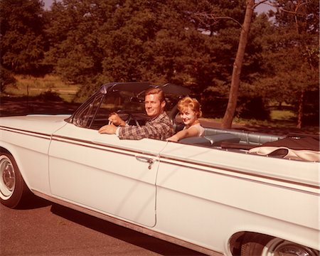 1960s SMILING COUPLE WHITE CONVERTIBLE CAR Stock Photo - Rights-Managed, Code: 846-02792547