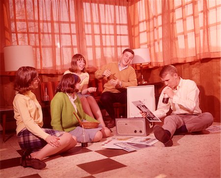 people listening to music 1960s - 1960s GROUP OF TEENS PLAYING RECORDS Stock Photo - Rights-Managed, Code: 846-02792563