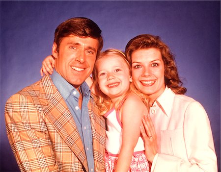 1970s HEAD SHOULDERS PORTRAIT SMILING FAMILY OF 3 Stock Photo - Rights-Managed, Code: 846-02792674