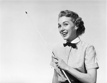 retro american woman - 1950s PORTRAIT WOMAN SMILING HOLDING POINTER LOOKING AT CAMERA Stock Photo - Rights-Managed, Code: 846-02792967