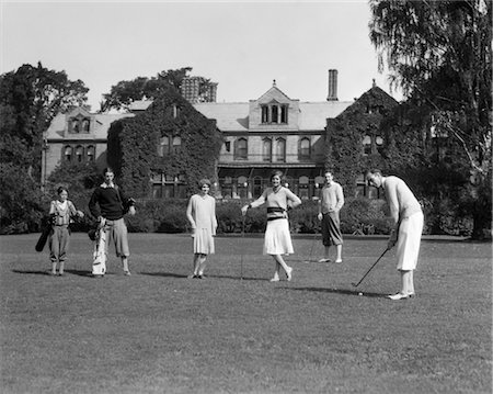 retro sport images - 1920s TWO WOMEN FOUR MEN UPPER CLASS PLAYING GOLF AT THE BERKSHIRES HUNT AND COUNTRY CLUB OUTDOOR Stock Photo - Rights-Managed, Code: 846-02793019