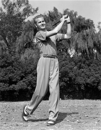 simsearch:846-02793390,k - 1930s MALE GOLFER SWINGING CLUB Stock Photo - Rights-Managed, Code: 846-02793025
