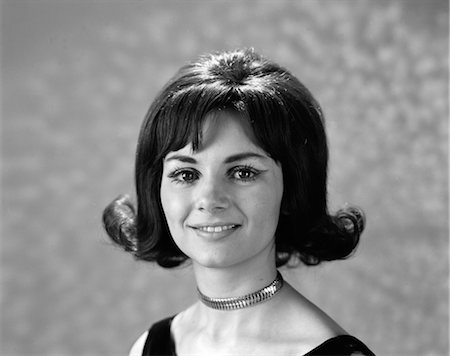 1960s 1970s PORTRAIT SMILING BRUNETTE WOMAN FLIP HAIR STYLE WITH BANGS Stock Photo - Rights-Managed, Code: 846-02793110