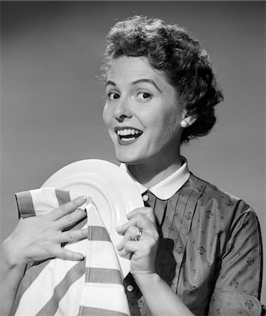 drying the dishes - 1950s WOMAN SMILING DRYING PLATE WITH STRIPE DISH TOWEL Stock Photo - Rights-Managed, Code: 846-02793137