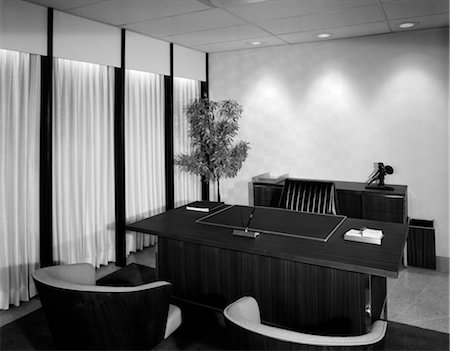 1960s EMPTY OFFICE INTERIOR WITH SMALL TREE ROMAN STATUE & 2 GUEST CHAIRS WITH WOOD VENEER ON BACK Stock Photo - Rights-Managed, Code: 846-02793406