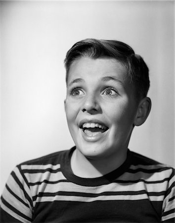 expresión facial - 1950s PORTRAIT HAPPY SMILING BOY STRIPE SHIRT LOOKING OFF TO SIDE FACIAL EXPRESSION Stock Photo - Rights-Managed, Code: 846-02793649