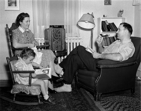 dad reads to children the book in the chair - 1930s-40s FAMILY RELAXING NEAR RADIO Stock Photo - Rights-Managed, Code: 846-02793679